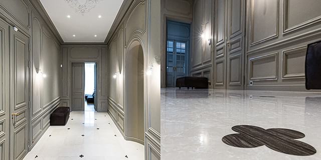 Revêtement de sol en marbre beige avec inserts découpés au jet d’eau marron